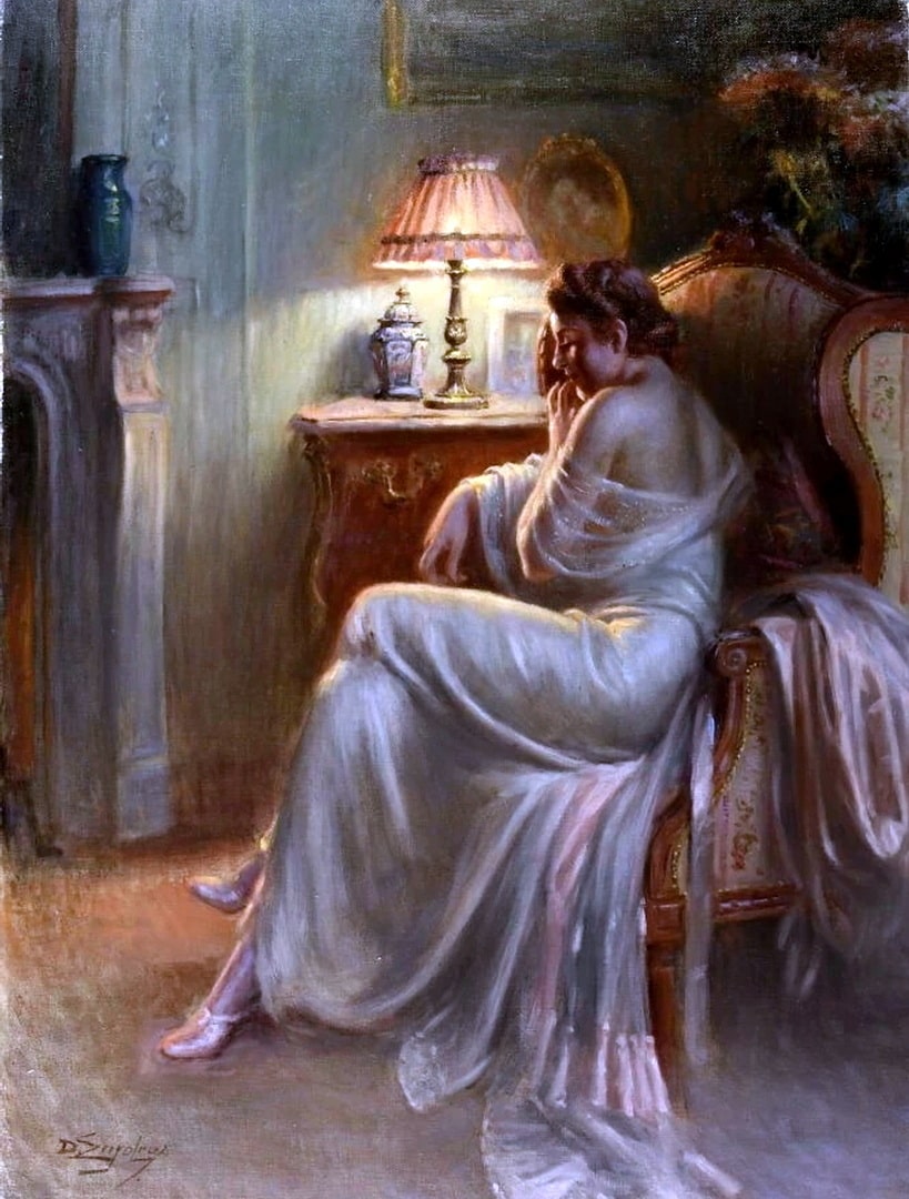 A woman in an off the shoulder pink night dress having fond thoughts.