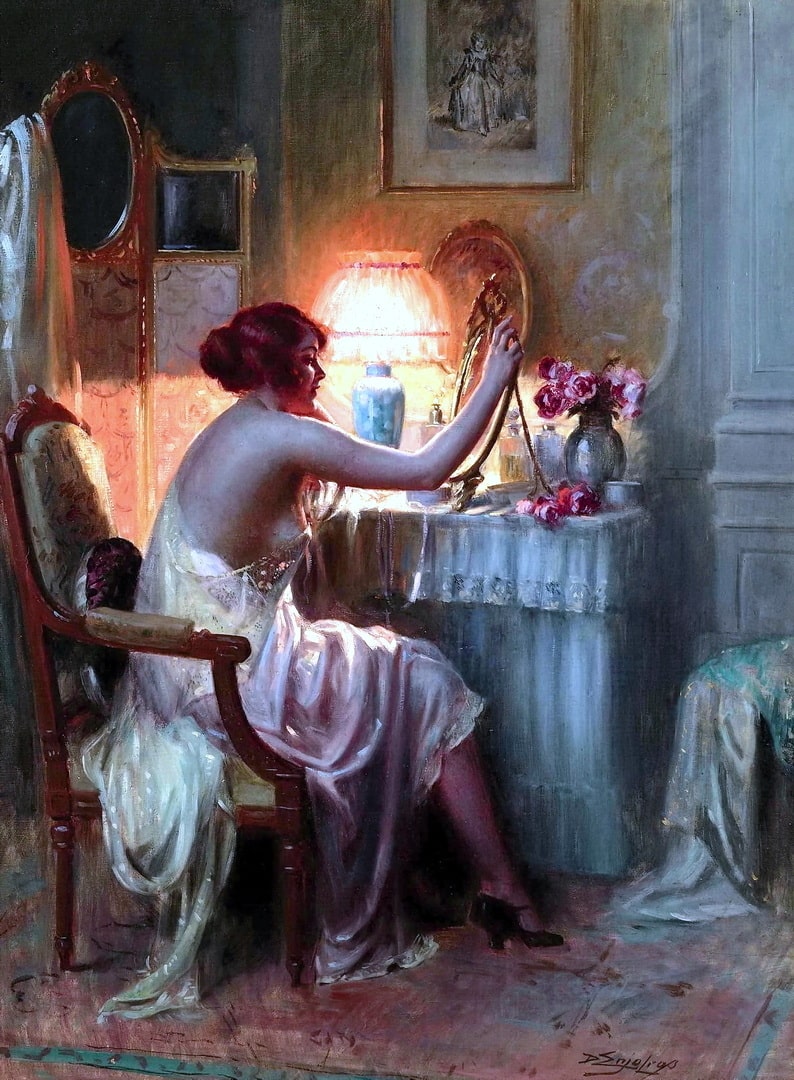 A lady in a pink sexy nightie looking at herself in the mirror. There are nice pink flowers on the dressing table.