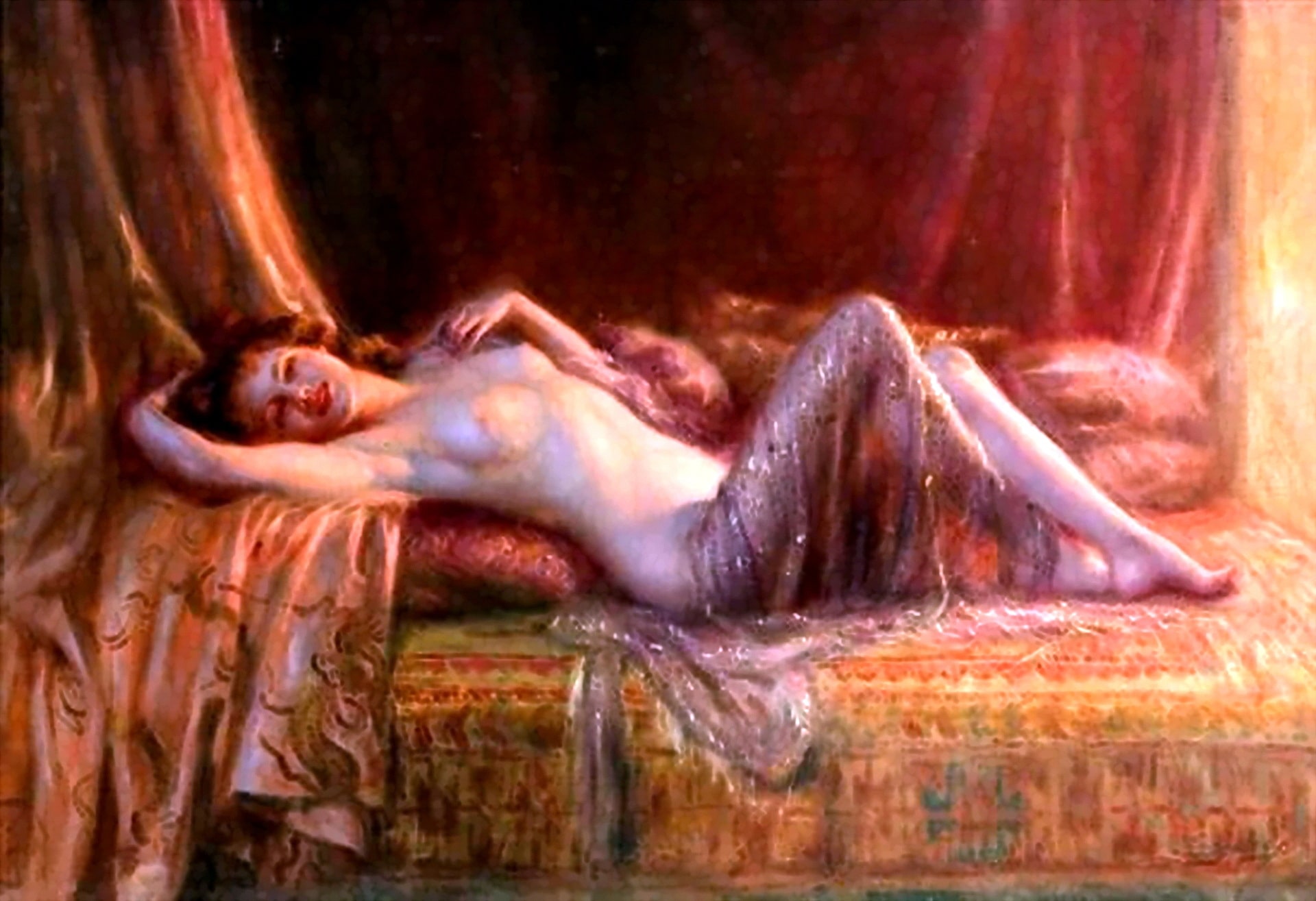 The naked lady from the harem has a see-through black shawl covering her sexy long legs. The foxy female has sensuous breasts and pretty eyes.