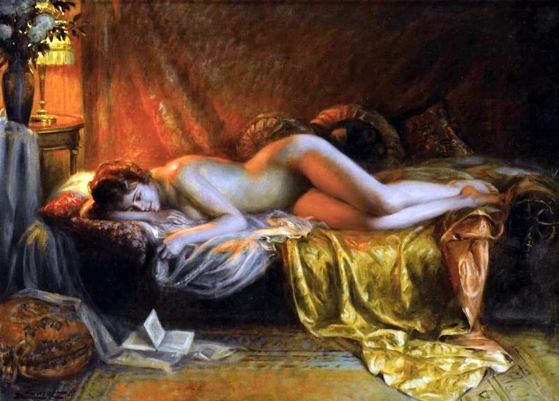 A beautiful naked women lying on her couch after finishing the book she was reading.