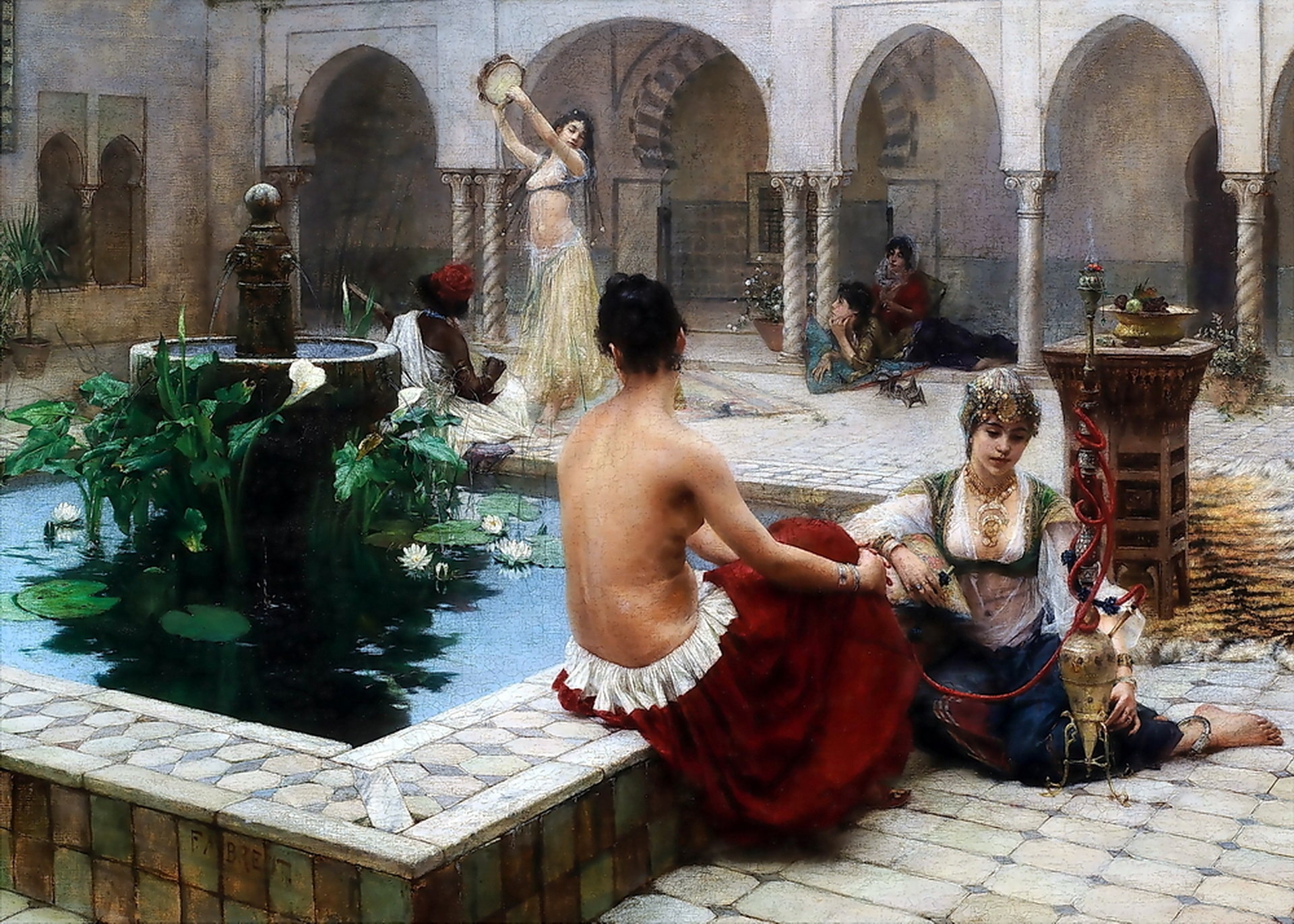 The Harem girls are sitting around the fountain with a bong one woman is semi naked