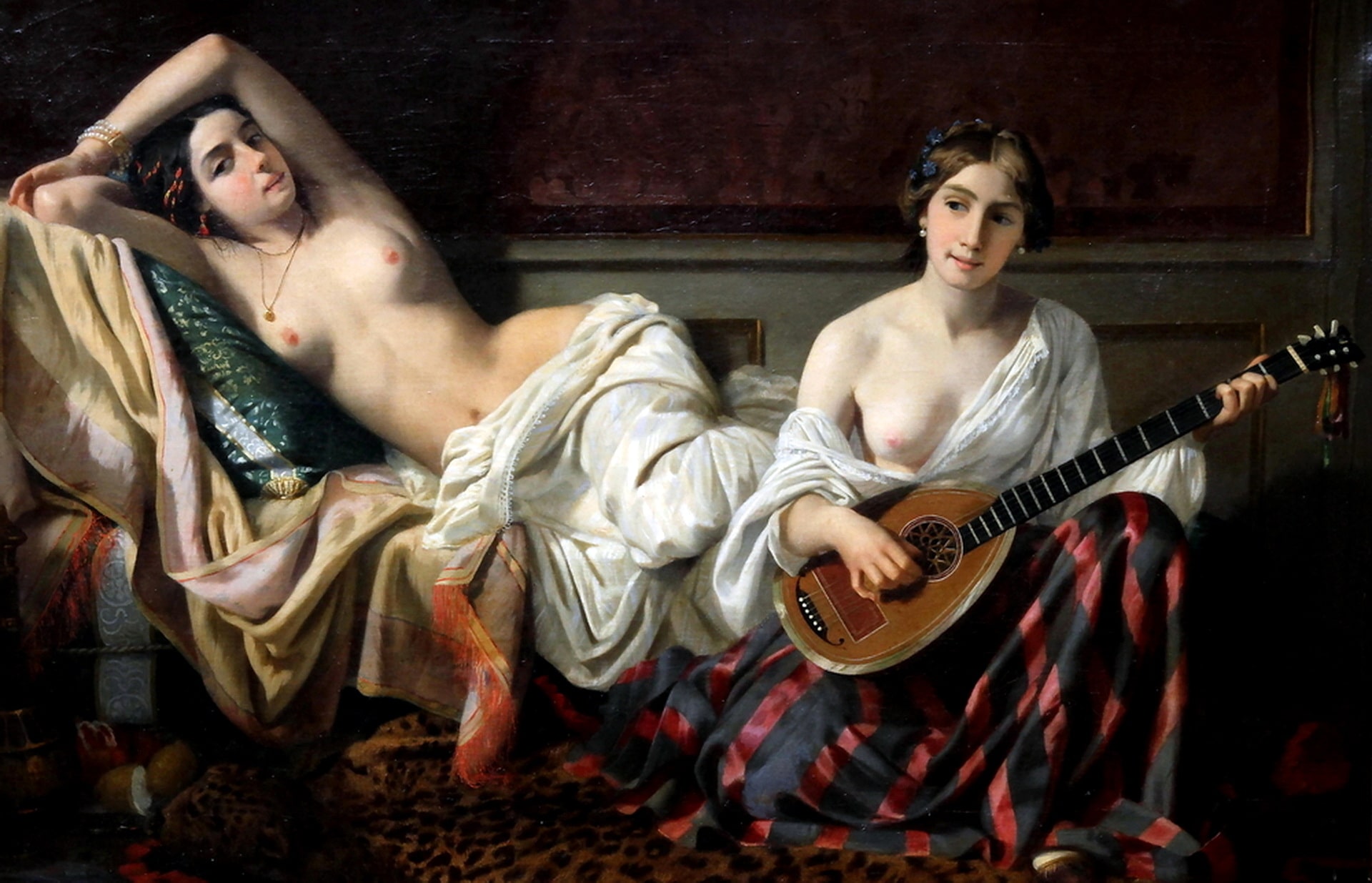 Singing in the harem while playing a guitar for the other lady.